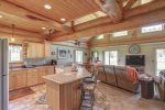 Elk Creek Retreat kitchen and main floor with log accents.
